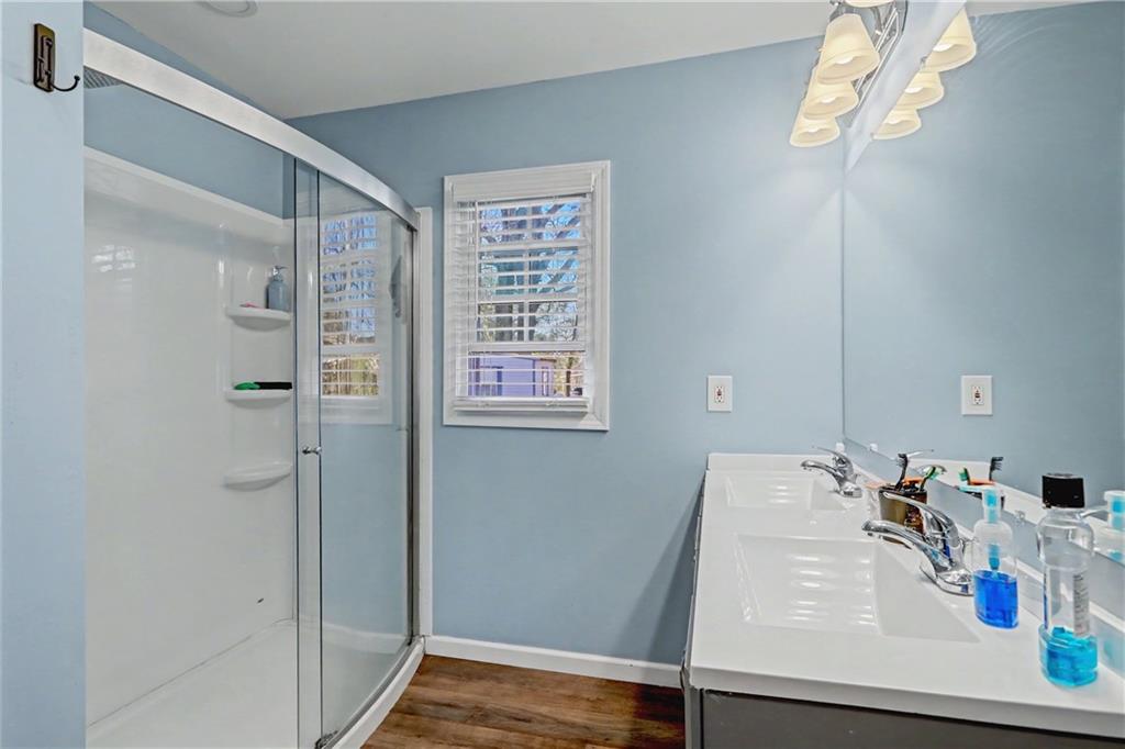 134 Church Road Thomaston, GA 30286 - Photo 16 of 33 a bathroom with a sink and a mirror