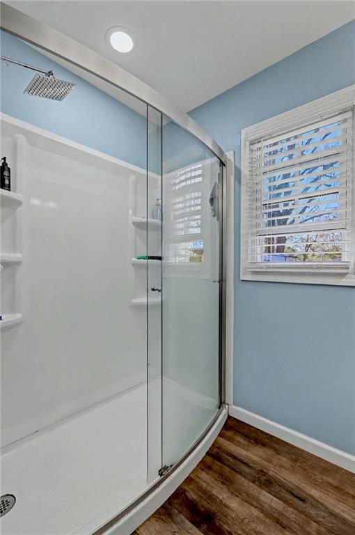 134 Church Road Thomaston, GA 30286 - Photo 17 of 33 a bathroom with a shower and a window