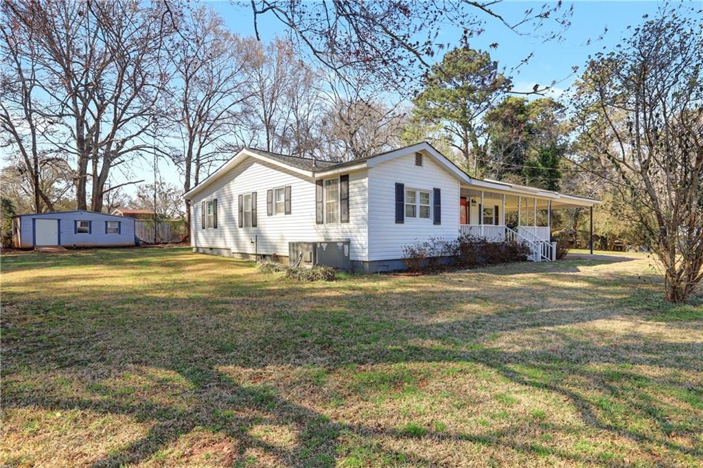 134 Church Road Thomaston, GA 30286 - Photo 29 of 33 a front view of house with yard and trees around