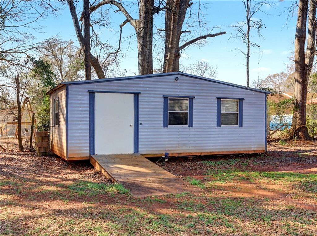 134 Church Road Thomaston, GA 30286 - Photo 30 of 33 a view of a house with a yard