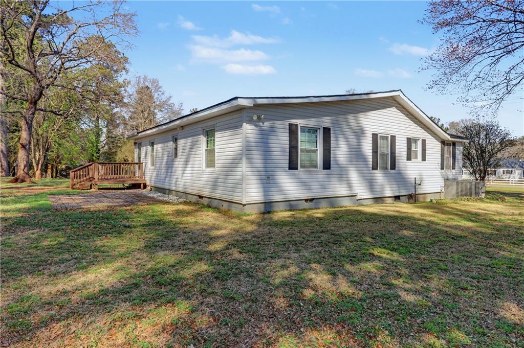 134 Church Road Thomaston, GA 30286 - Photo 31 of 33 a front view of house with yard and trees around