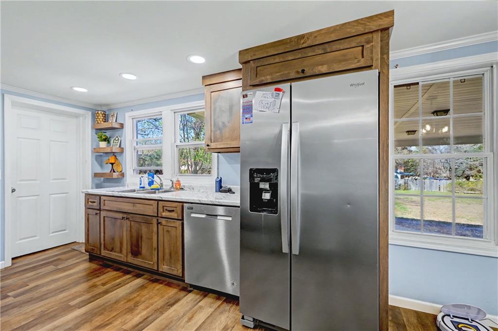 134 Church Road Thomaston, GA 30286 - Photo 9 of 33 a kitchen with stainless steel appliances a refrigerator and a sink
