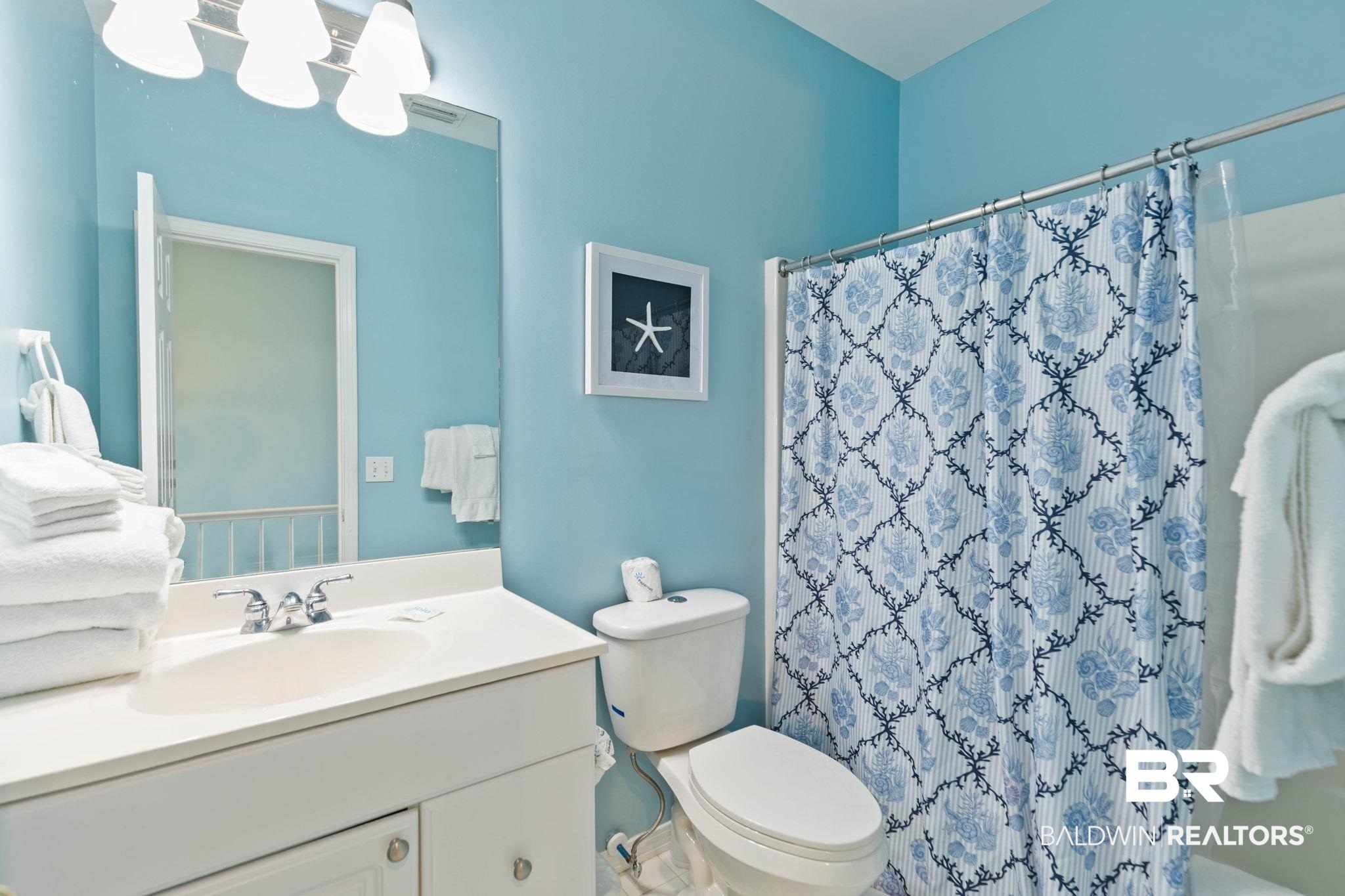 545 Plantation Road, Unit 3 Gulf Shores, AL 36542 - Photo 35 of 54 Full bath featuring vanity and curtained shower