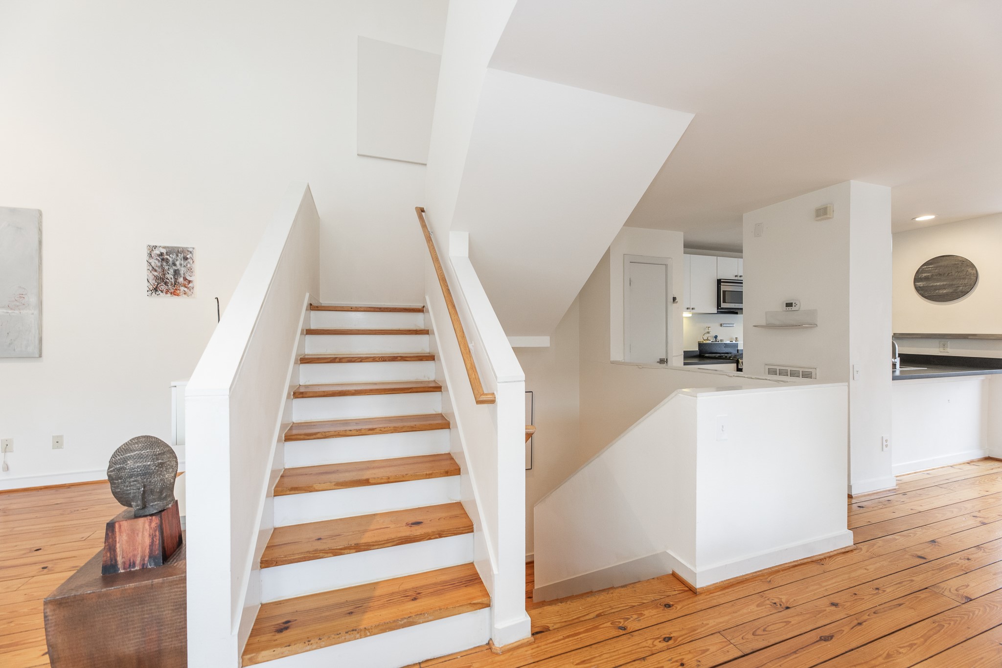 2714 Chenevert Street Houston, TX 77004 - Photo 26 of 40 a view of entryway and hall with wooden floor