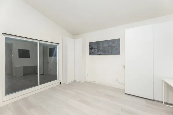 a view of a room with a hallway