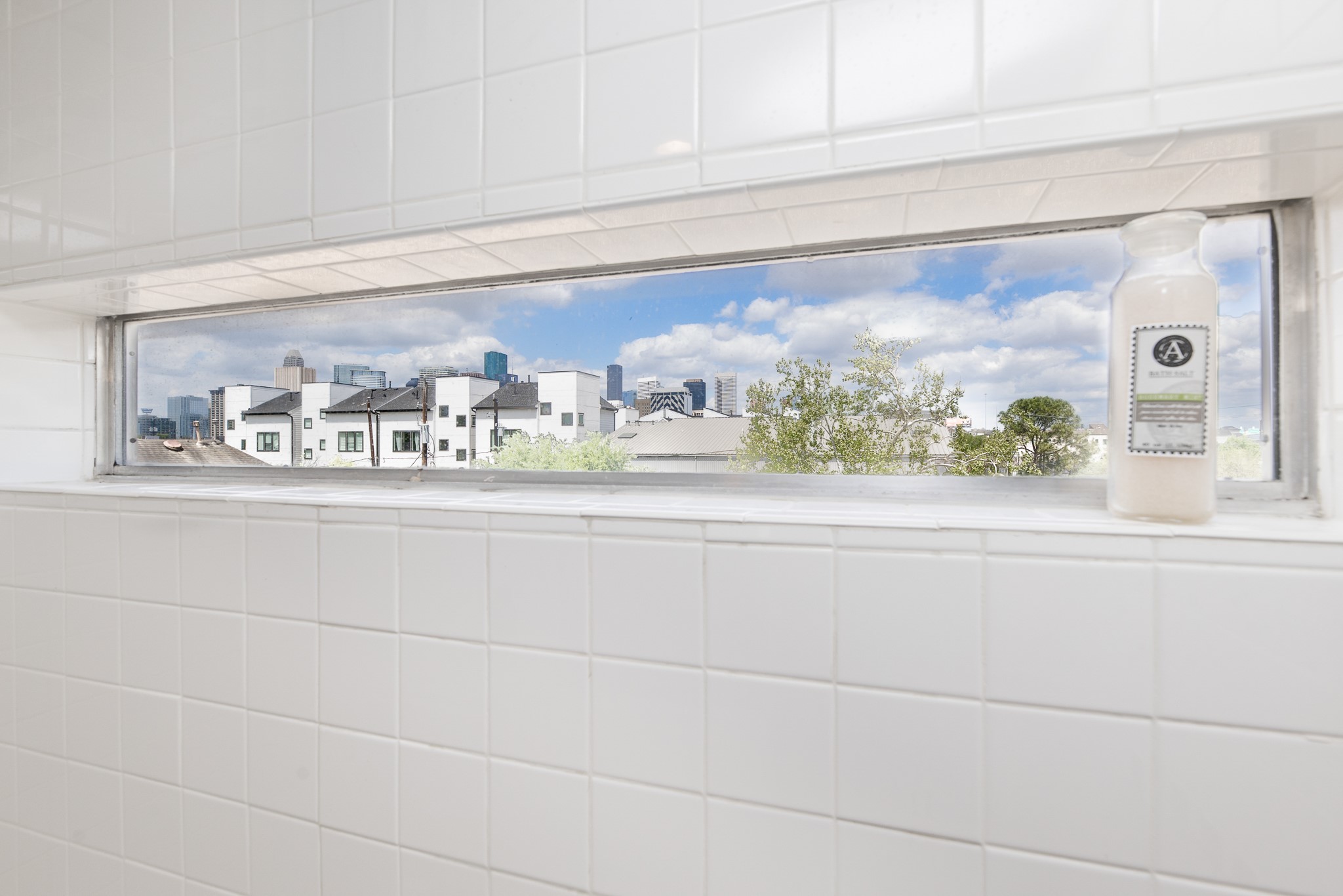 2714 Chenevert Street Houston, TX 77004 - Photo 36 of 40 a bathroom with a window