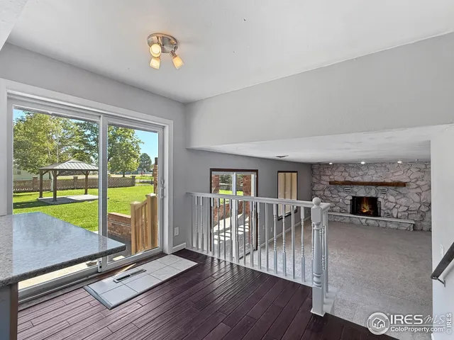a view of livingroom with furniture and fireplace