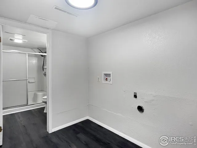 a bathroom with a sink and a shower