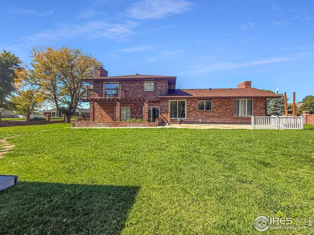 a view of a house with a big yard