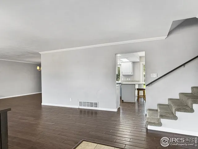a view of dining room with wooden floor