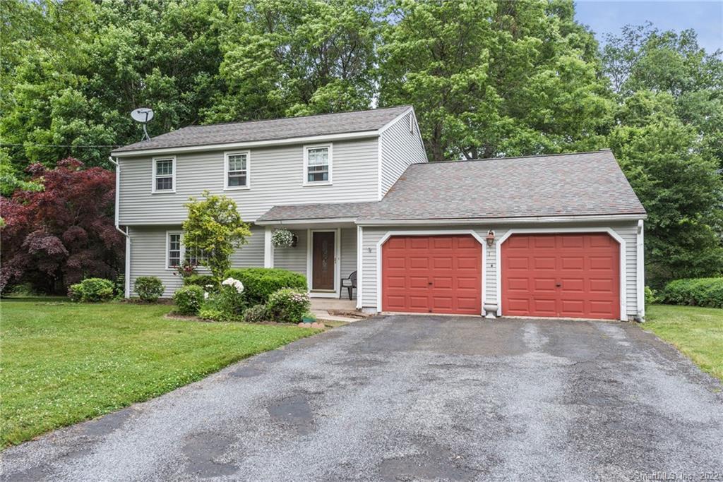 10 Seiter Hill Road Wallingford, CT 06492 - Photo 1 of 1 a front view of a house with a yard and garage