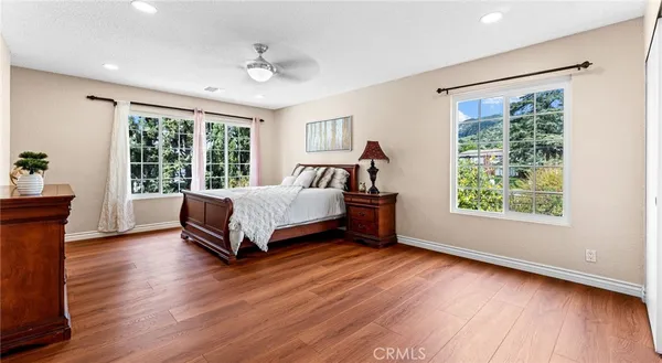 a bed room with a bed and a night stand