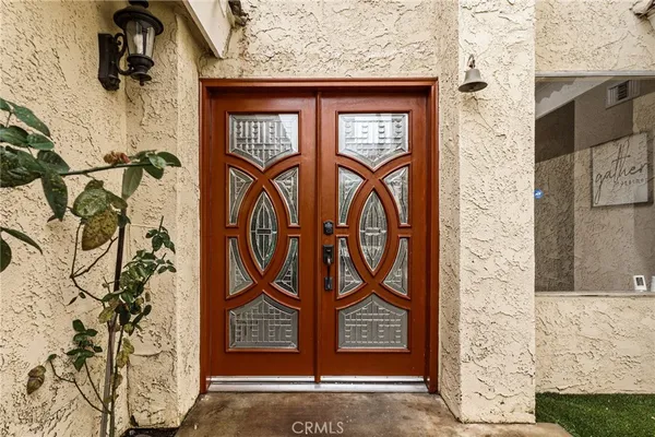 a front view of a building with sign board