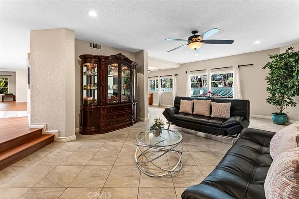 a living room with furniture and window