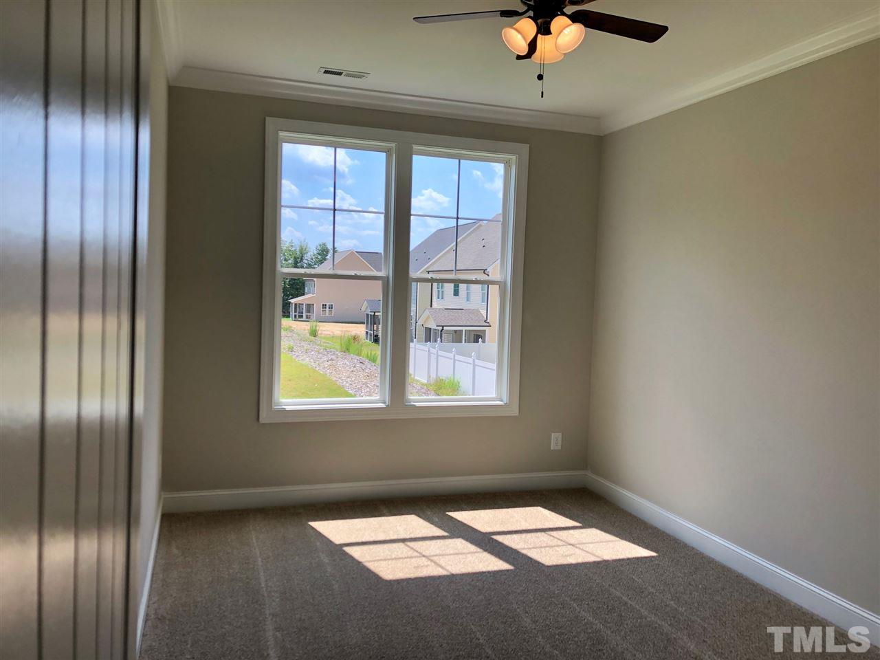 3717 Massey Ridge Court Raleigh, NC 27616 - Photo 12 of 24 a view of an empty room with a window