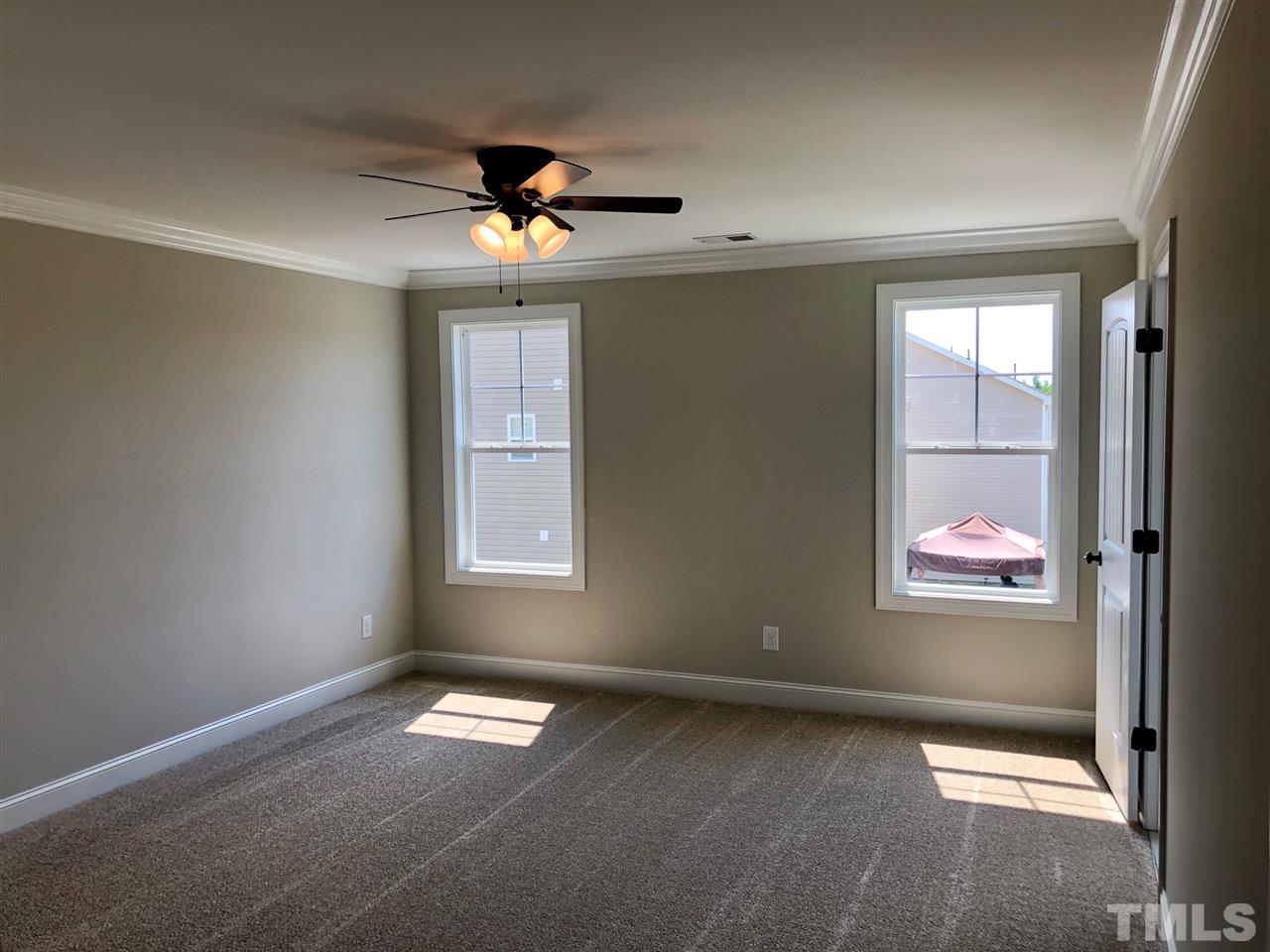3717 Massey Ridge Court Raleigh, NC 27616 - Photo 13 of 24 a view of an empty room with a window