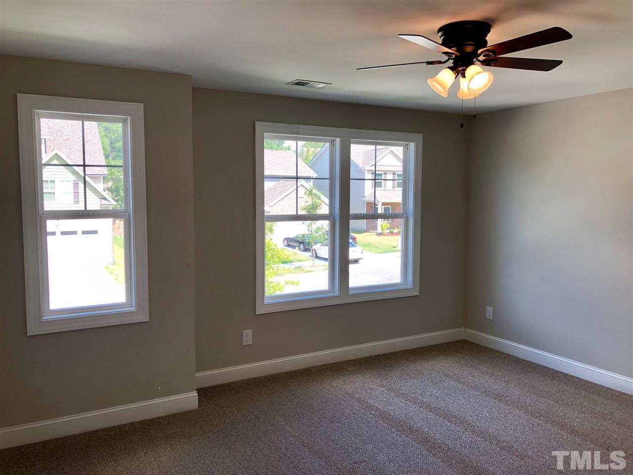 3717 Massey Ridge Court Raleigh, NC 27616 - Photo 18 of 24 a view of an empty room with a window
