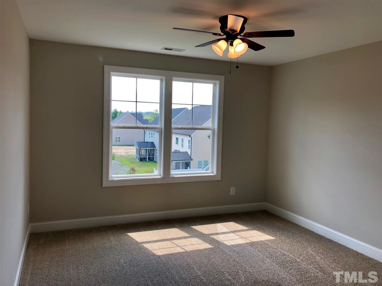 3717 Massey Ridge Court Raleigh, NC 27616 - Photo 19 of 24 a view of an empty room with a window