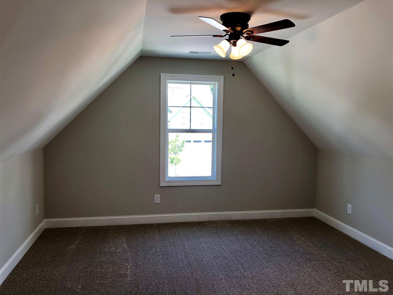 3717 Massey Ridge Court Raleigh, NC 27616 - Photo 23 of 24 a view of an empty room with a window
