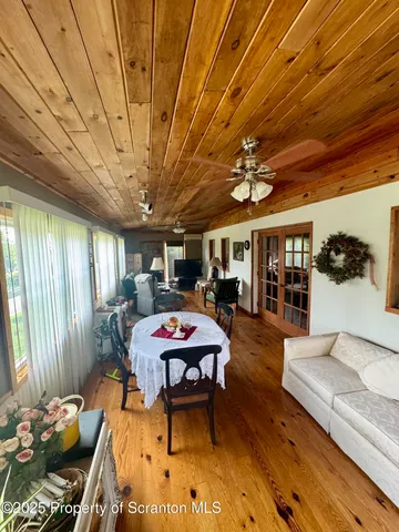 a bed room with furniture and a window