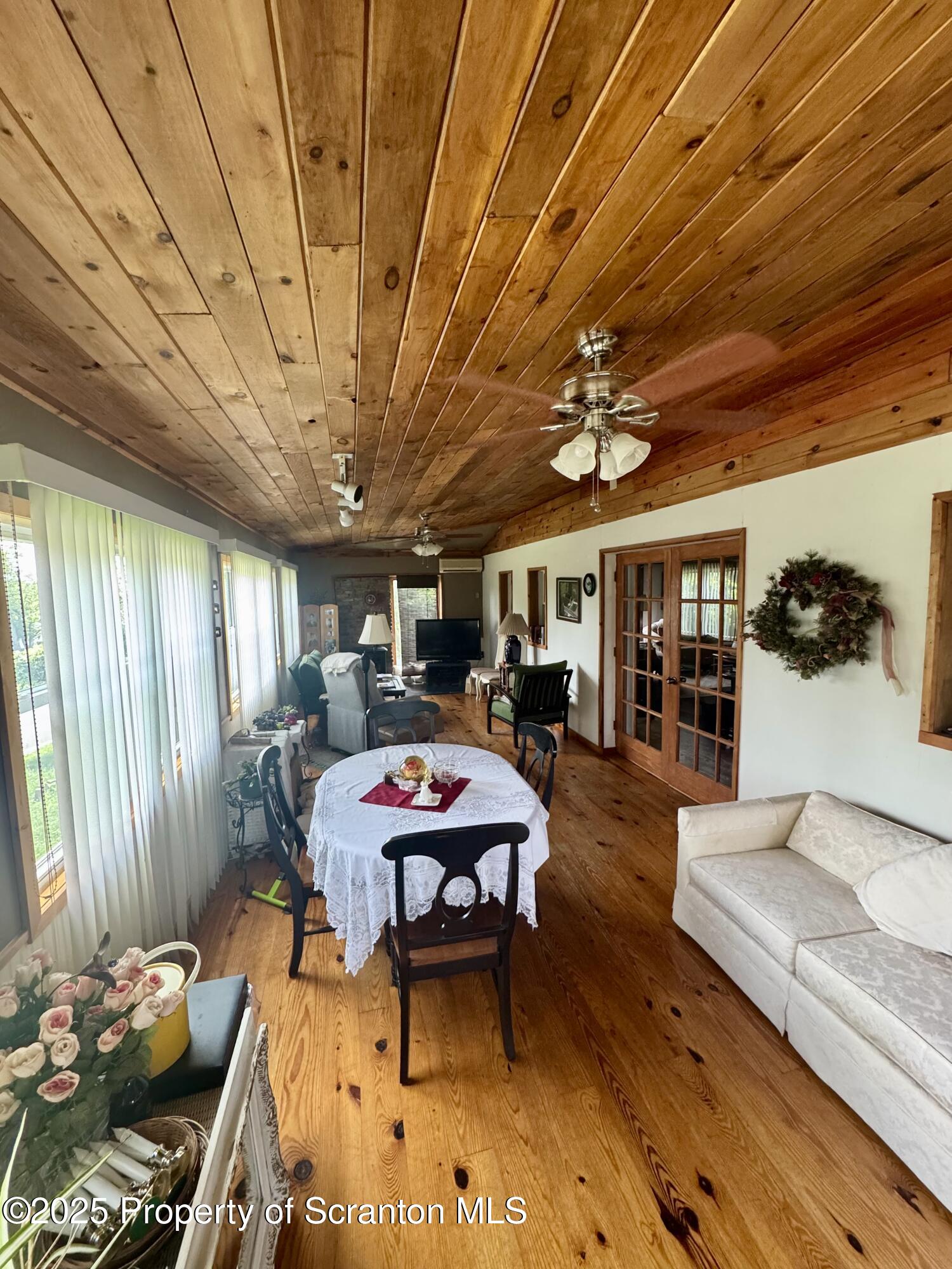 1325 Fairview Road Clarks Summit, PA 18411 - Photo 15 of 21 a view of a dining hall with furniture and a chandelier