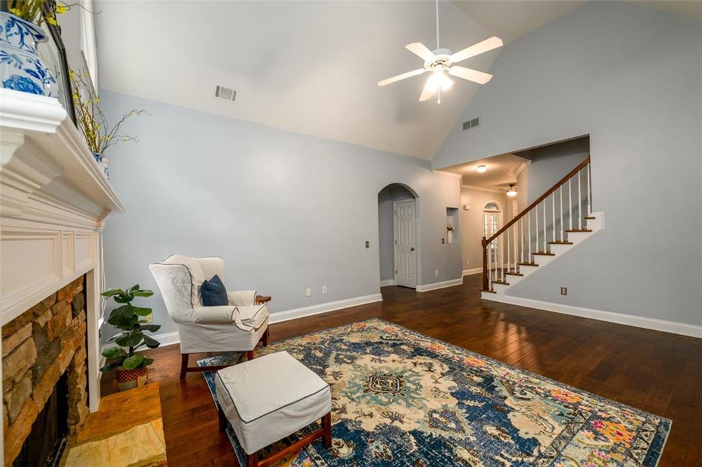 284 Graymist Path Southwest Loganville, GA 30052 - Photo 11 of 45 a living room with furniture and a fireplace