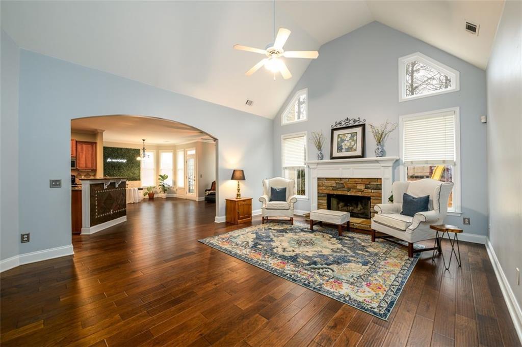 284 Graymist Path Southwest Loganville, GA 30052 - Photo 13 of 45 a living room with furniture and a fireplace