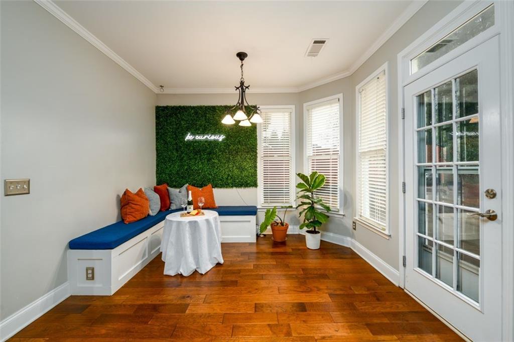 284 Graymist Path Southwest Loganville, GA 30052 - Photo 19 of 45 a bed room with furniture and a chandelier