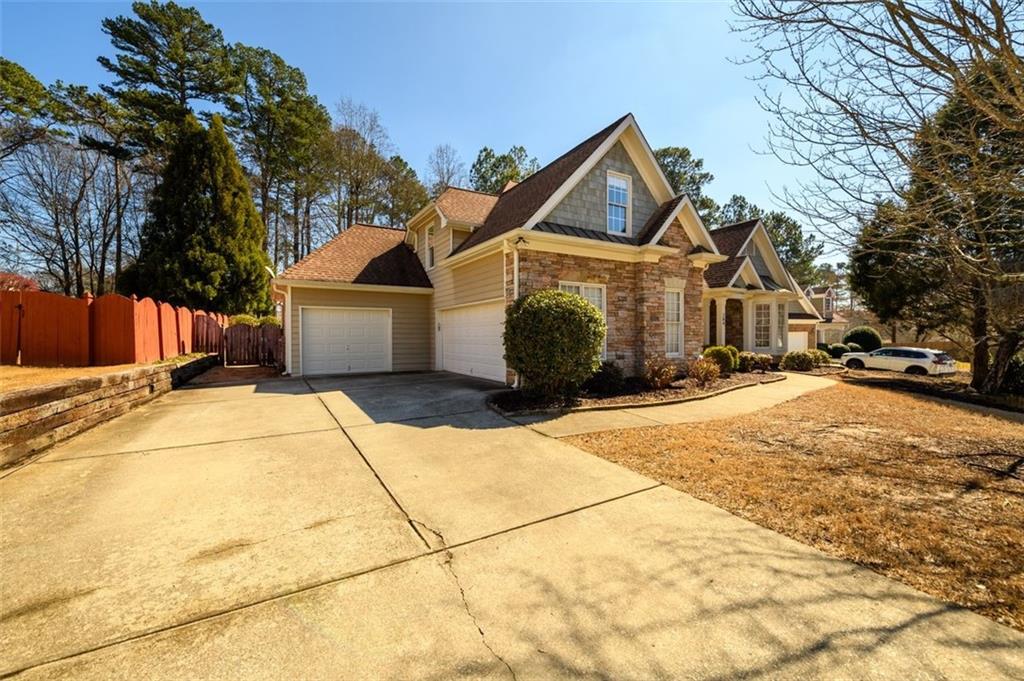 284 Graymist Path Southwest Loganville, GA 30052 - Photo 2 of 45 a front view of a house with a yard