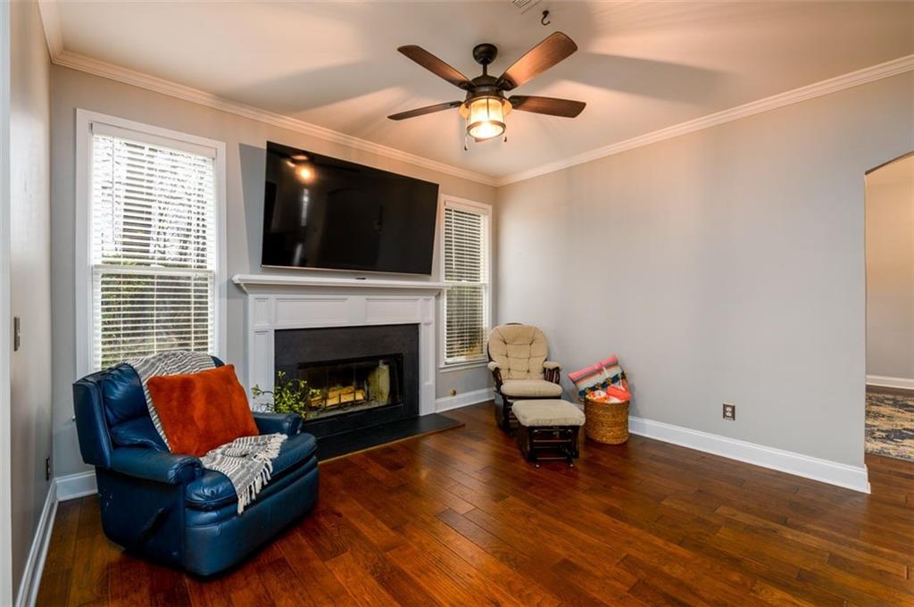 284 Graymist Path Southwest Loganville, GA 30052 - Photo 22 of 45 a living room with furniture and a fireplace