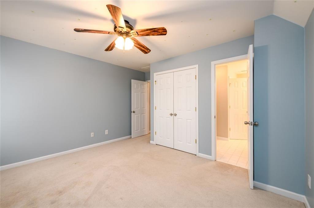 284 Graymist Path Southwest Loganville, GA 30052 - Photo 30 of 45 a view of an empty room and chandelier fan
