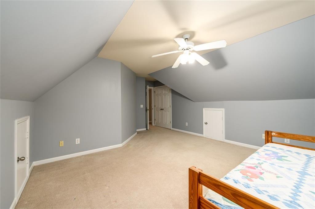 284 Graymist Path Southwest Loganville, GA 30052 - Photo 34 of 45 a view of a livingroom with a ceiling fan and window