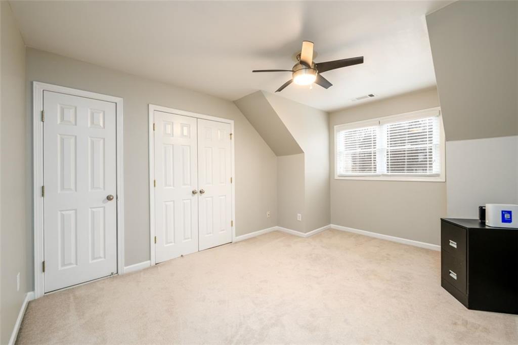 284 Graymist Path Southwest Loganville, GA 30052 - Photo 35 of 45 a view of an empty room with a window