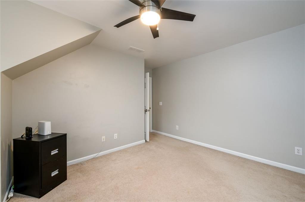 284 Graymist Path Southwest Loganville, GA 30052 - Photo 36 of 45 a view of an empty room and chandelier fan