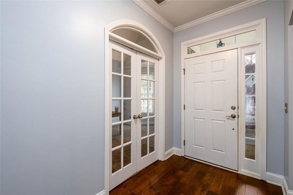 284 Graymist Path Southwest Loganville, GA 30052 - Photo 4 of 45 wooden floor with white walls
