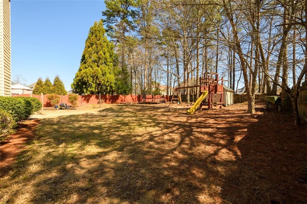 284 Graymist Path Southwest Loganville, GA 30052 - Photo 41 of 45 a view of a playground with basketball court