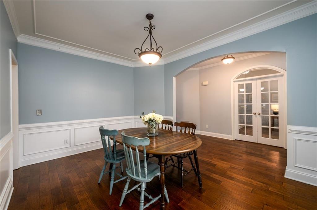 284 Graymist Path Southwest Loganville, GA 30052 - Photo 8 of 45 a view of a dining room with furniture window and wooden floor