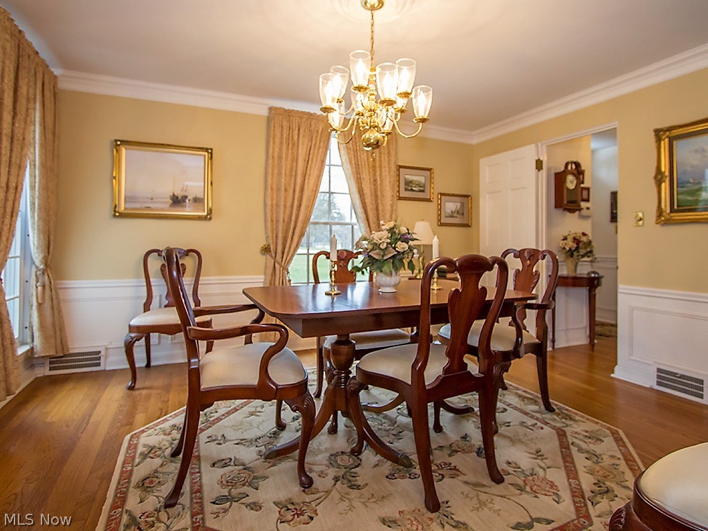 3047 Edgewood Road Cleveland, OH 44124 - Photo 5 of 35 Formal Dining Room with Chandelier and Hardwood Floors