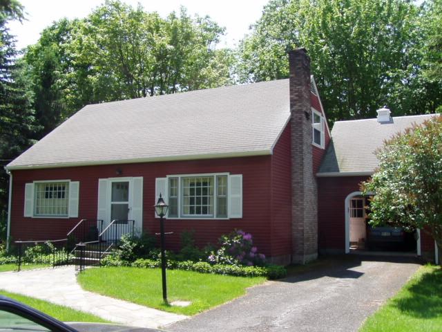 17 Winona Road Mount Pocono, PA 18344 - Photo 2 of 10 a view of a house with a yard and potted plants