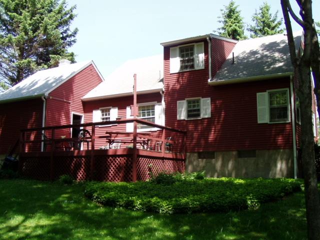 17 Winona Road Mount Pocono, PA 18344 - Photo 7 of 10 a front view of a house with a garden