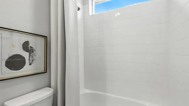 a room with furniture and a window