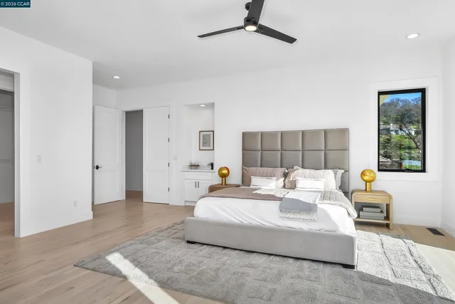 a view of a patio with a table and chairs