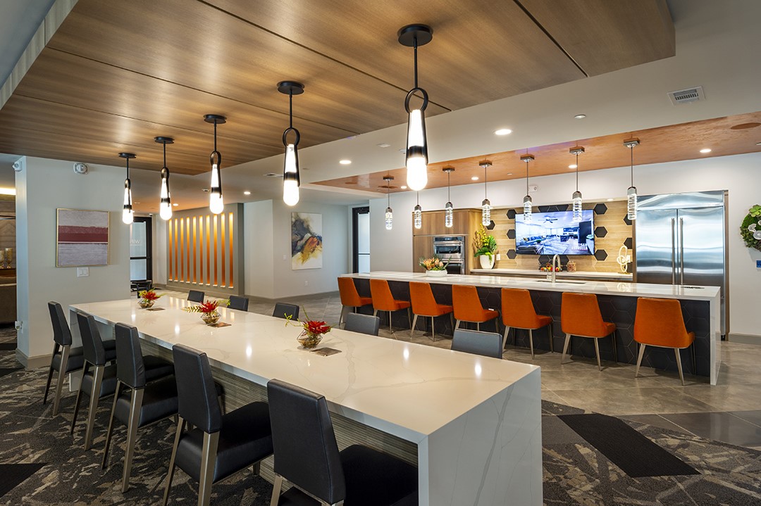 1724 Partnership Way, Unit 1263 Katy, TX 77449 - Photo 15 of 26 a large kitchen with a table and chairs