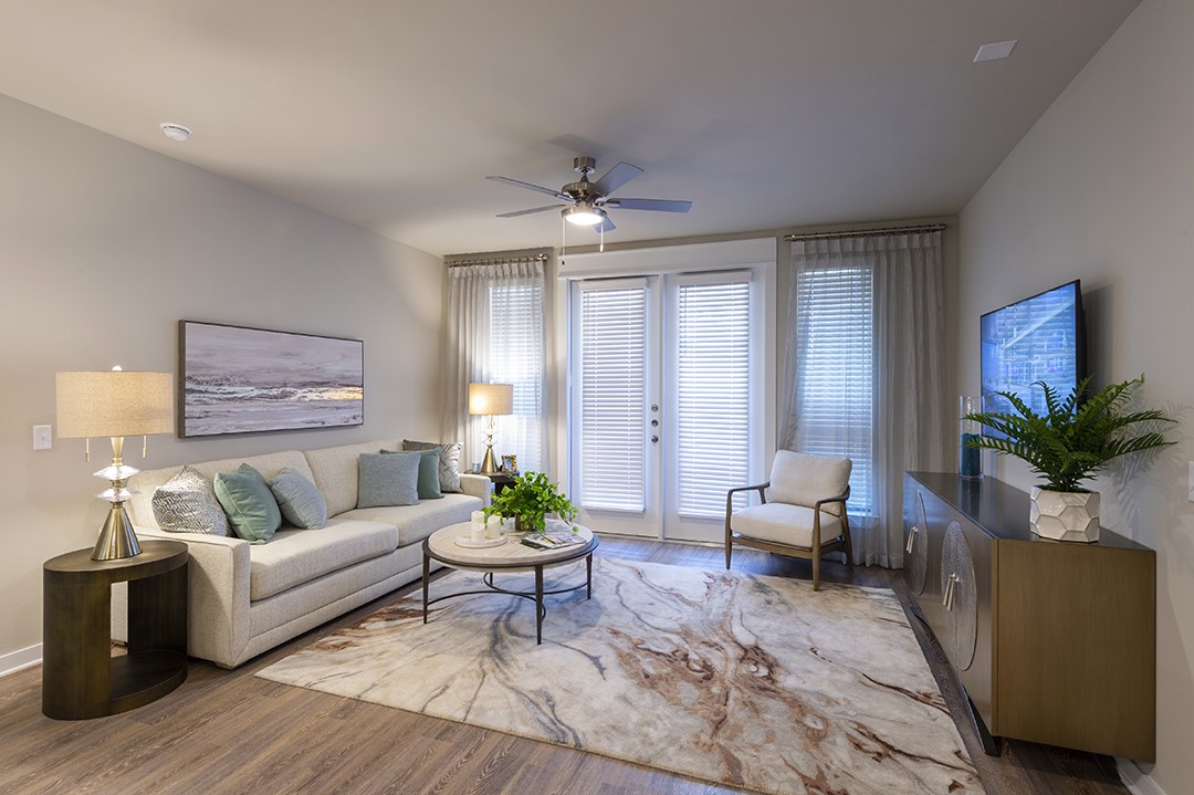 1724 Partnership Way, Unit 1263 Katy, TX 77449 - Photo 5 of 26 a living room with furniture and wooden floor