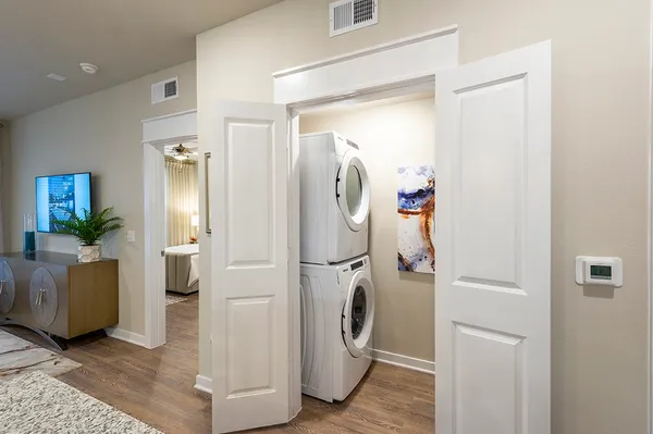 a view of a storage & utility room with a washer and dryer