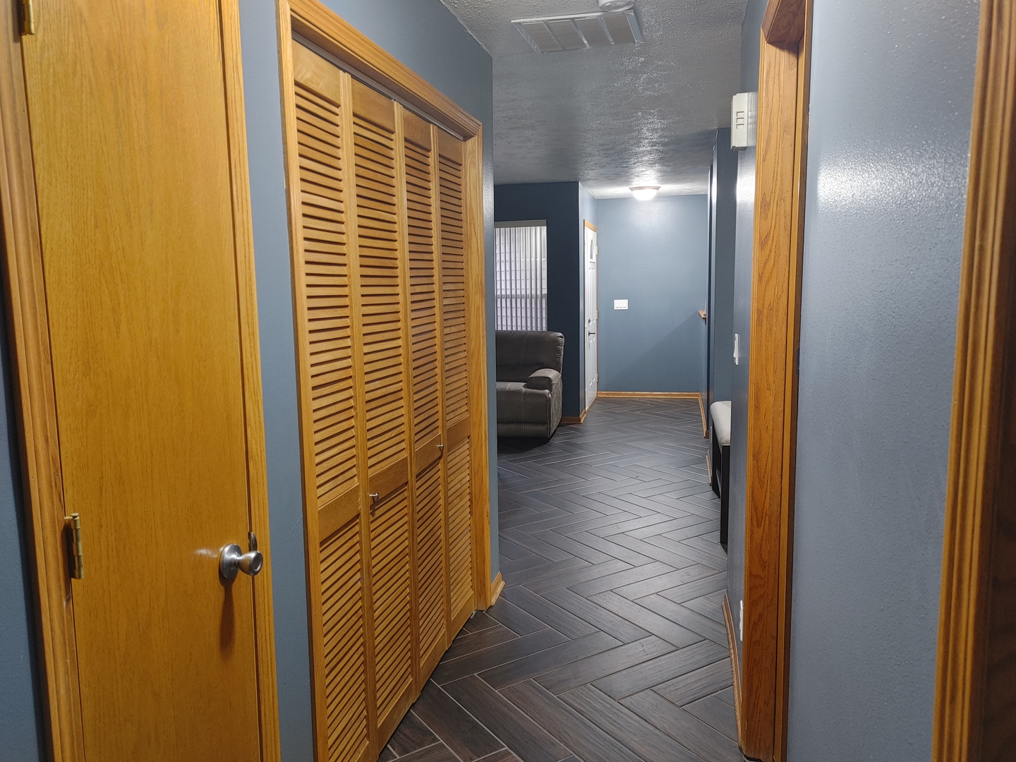 150 North Wooster Street, Unit 9 Capron, IL 61012 - Photo 11 of 23 a view of a hallway with wooden floor