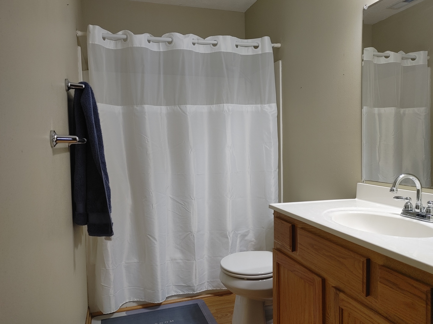150 North Wooster Street, Unit 9 Capron, IL 61012 - Photo 16 of 23 a bathroom with a sink toilet and vanity