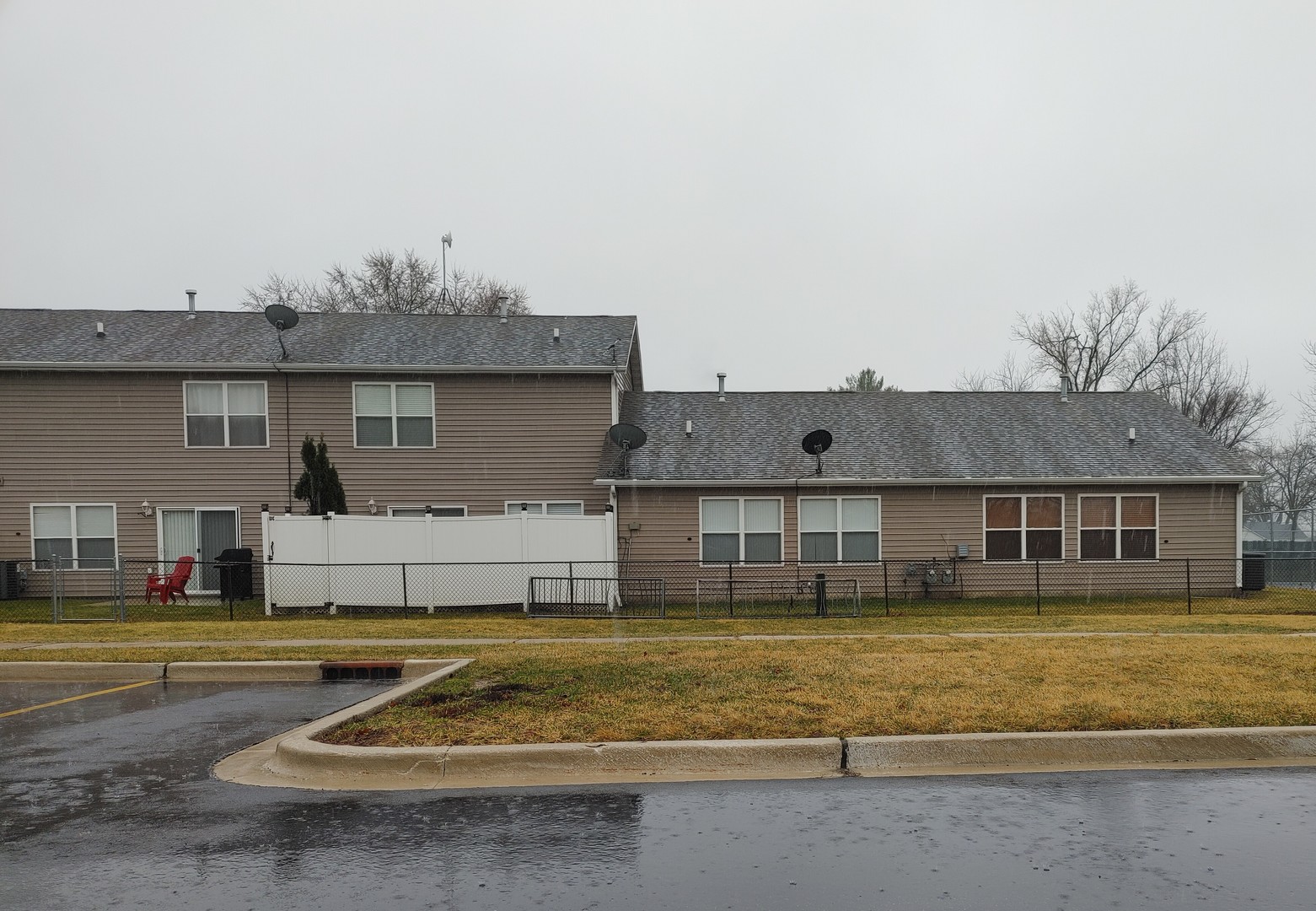 150 North Wooster Street, Unit 9 Capron, IL 61012 - Photo 21 of 23 a front view of a house with a yard