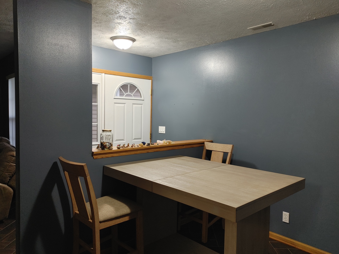 150 North Wooster Street, Unit 9 Capron, IL 61012 - Photo 7 of 23 a view of a kitchen with a table and chairs
