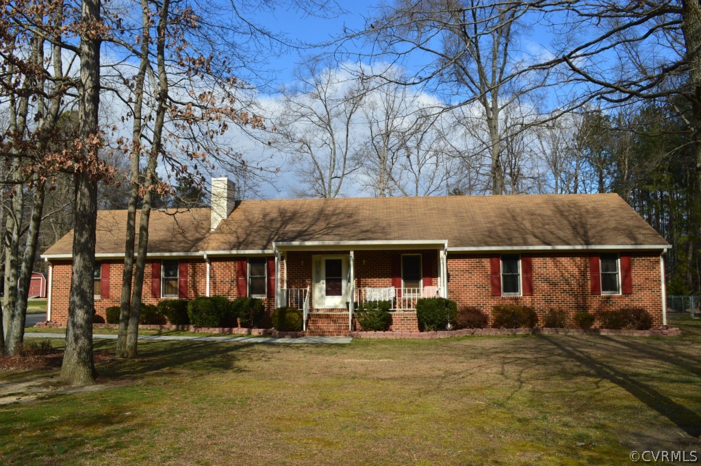 1820 Mill Road Henrico, VA 23231 - Photo 2 of 24 a front view of a house with a garden
